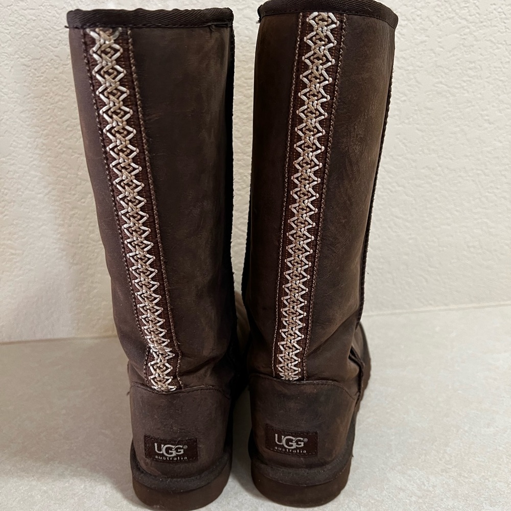 Woman’s UGG Size 9 tall boot in brown leather 
These are in very good condition.